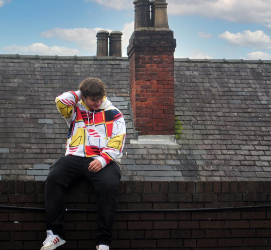 Me sitting on a rooftop